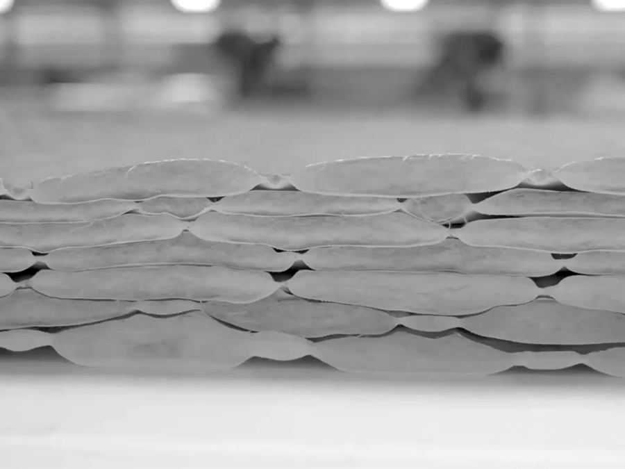 Cut quilted panels, stacked