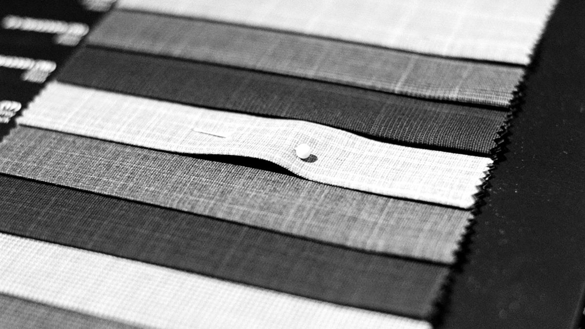 Fabric swatches on the sample table
