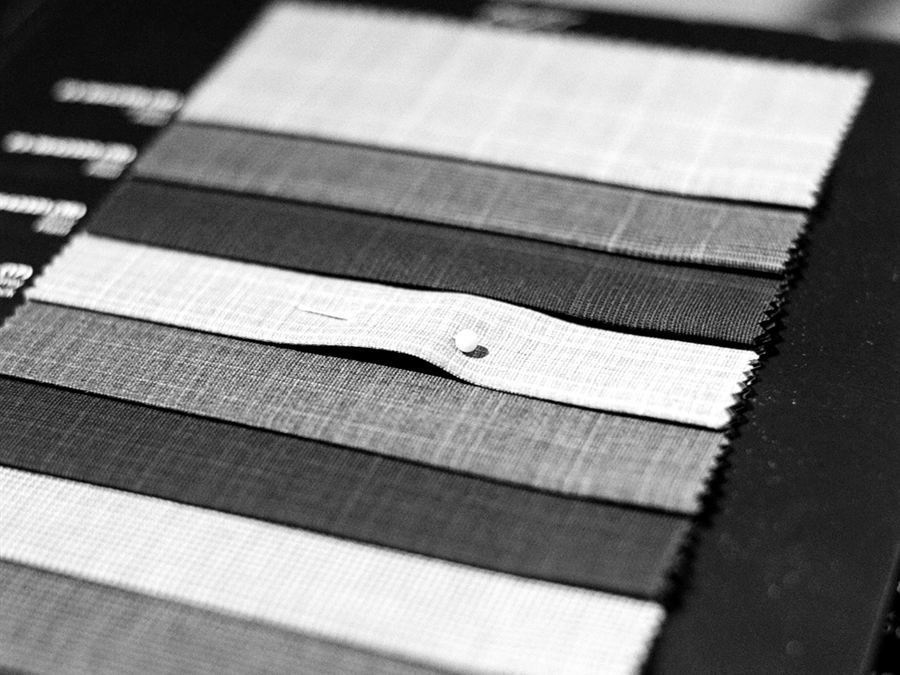 Fabric swatches on the sample table